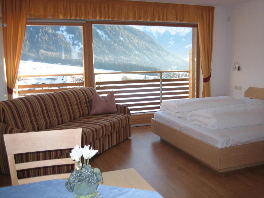 Garni - Appartement Neumairhof Oberrasen Rum bild